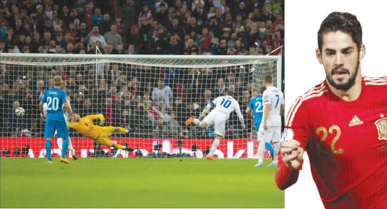 إيسكو نجم إسبانيا الشاب تألق وأحرز هدفا رائعا (إ.ب.أ)، روني (رقم 10) يسدد ركلة الجزاء مسجلا أول أهداف إنجلترا في مرمى سلوفينيا (أ.ب)