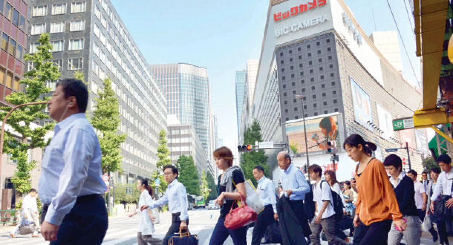 بهذا التراجع يوجه الاقتصاد الياباني ضربة جديدة لنمو الاقتصاد العالمي وسوق النفط (أ.ف.ب)