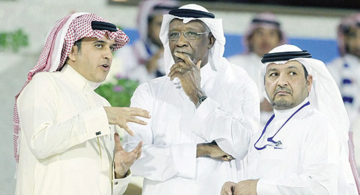 أحمد عيد والأمين العام أحمد الخميس وحافظ المدلج خلال البطولة