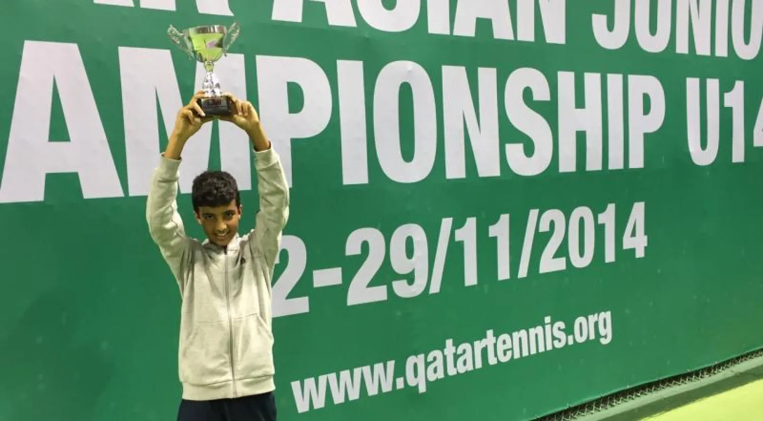 السعودي الحقباني خلال تتويجه بكأس آسيا للتنس