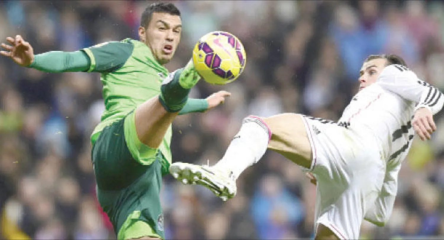 مباراة ريال مدريد سيلتا فيغو الأخيرة شهدت إطلاق الجماهير المدريدية أهازيج مهينة لميسي (أ.ف.ب)