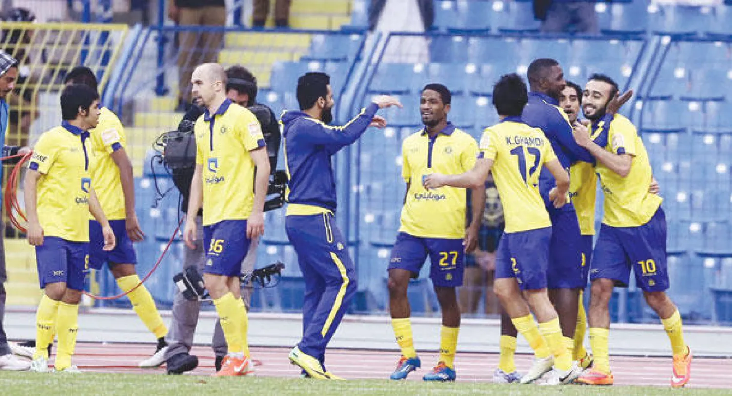 لاعبو النصر يحتفلون بفوزهم الأخير على الهلال (تصوير: عبد العزيز النومان)