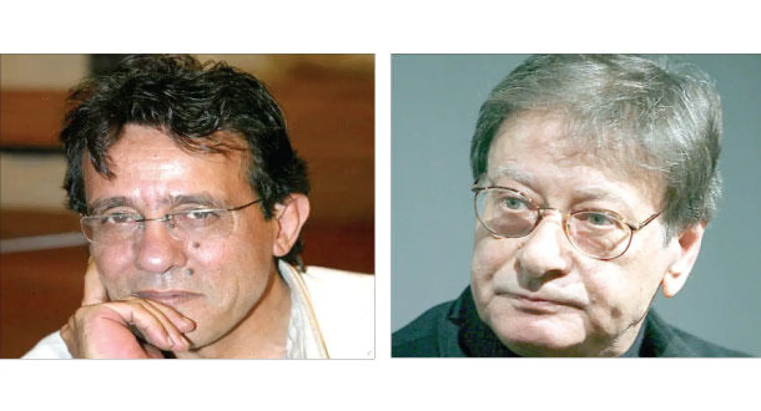 الشاعر الراحل محمود درويش و الشاعر غسان زقطان