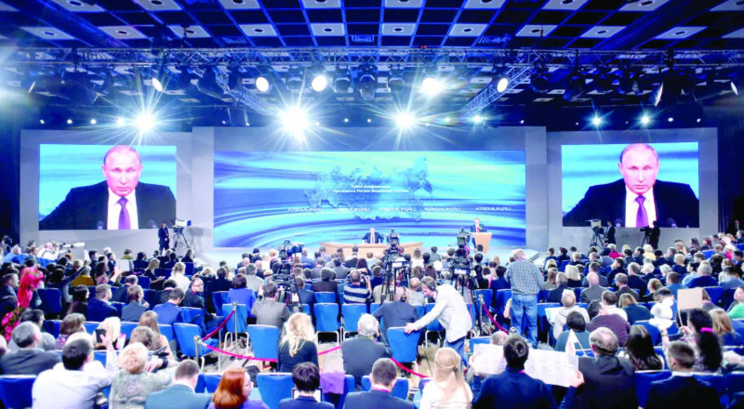 بوتين يتحدث خلال مؤتمره الصحافي السنوي في موسكو أمس (أ.ف.ب)