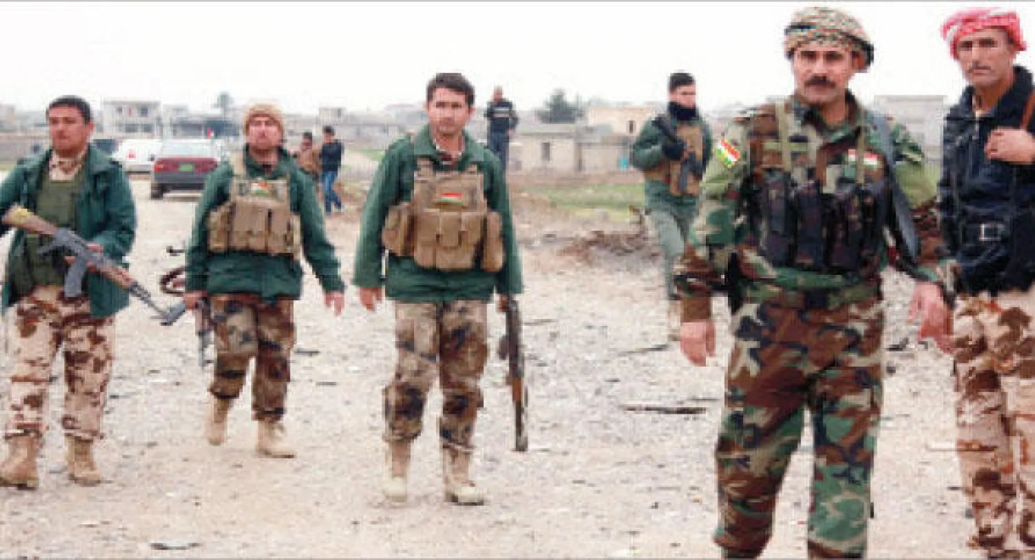 عناصر في البيشمركة ينتشرون في ناحية زمار غرب الموصل (رويترز)