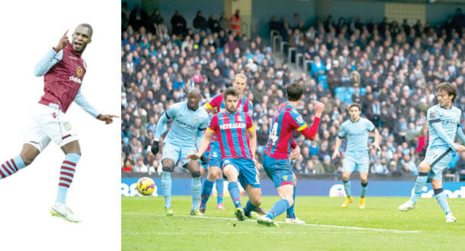 سيلفا يسدد ويحرز هدفه وهدف سيتي الثاني (أ.ب)  -  كريستيان بنتيكي بعد احرازه هدف أستون فيلا في مرمى مانشستر يونايتد