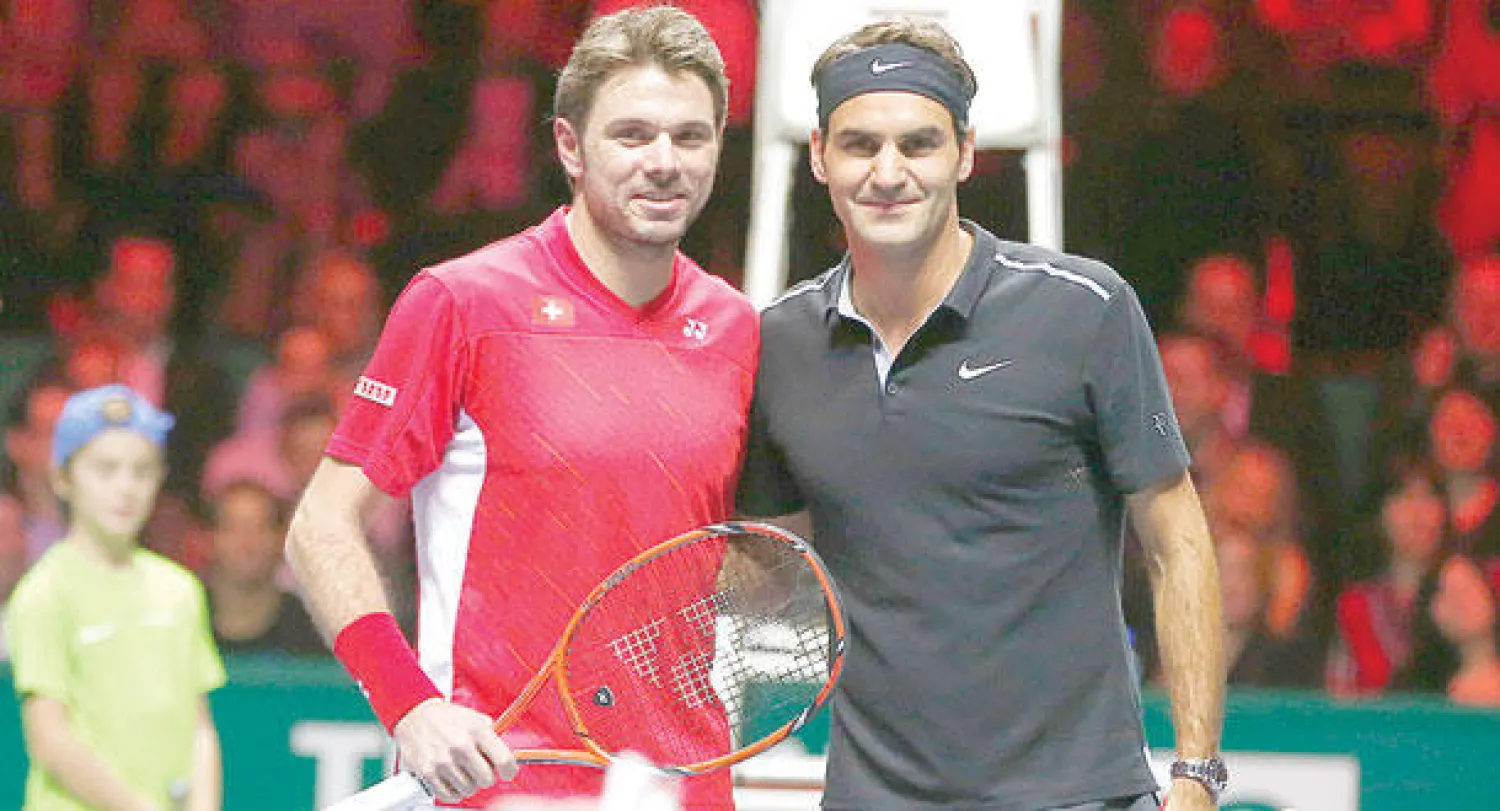 فيدرر وفافرينكا نجما سويسرا في التنس (رويترز)