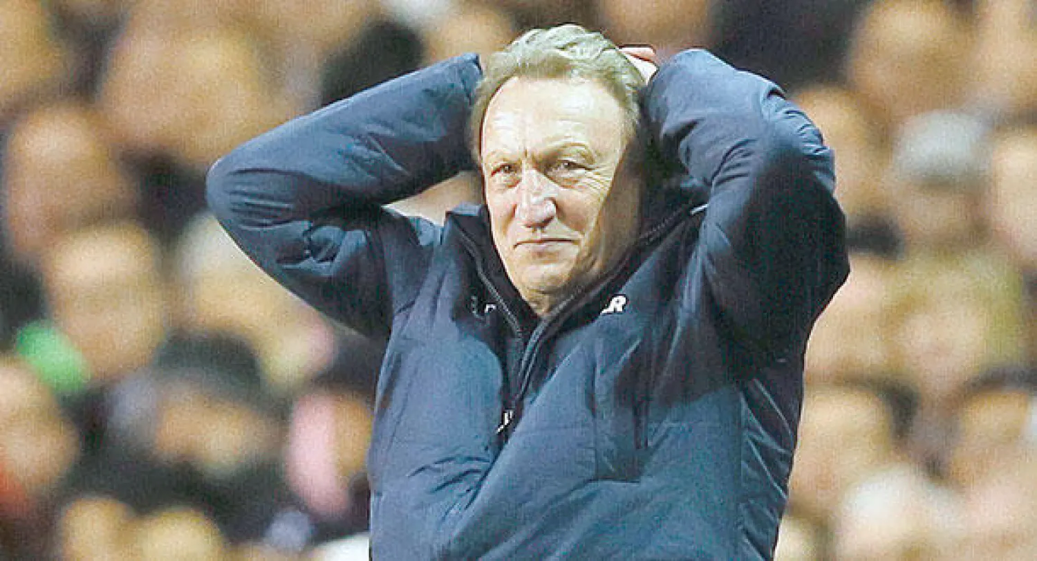 وارنوك قبل الاستغناء عن خدماته (أ.ب)