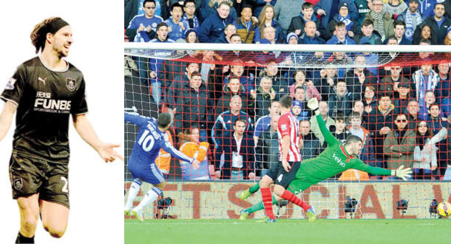 هازارد نجم تشيلسي (رقم 10 يسار) يسدد في مرمى ساوثهامبتون ليمنح فريقه نقطة التعادل (إ.ب.أ)  -  بويد نجم بيرنلي يحتفل بهدفه في مرمى سيتي (إ.ب.أ)