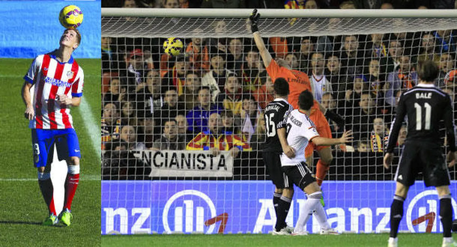 كاسياس حارس ريـال مدريد في محاولة فاشلة للتصدي لرأسية أوتاماندي لاعب فالنسيا (بالقميص الأبيض) (أ.ب)  -  توريس يستعرض بالكرة في ملعب كالديرون أمس (إ.ب.أ)