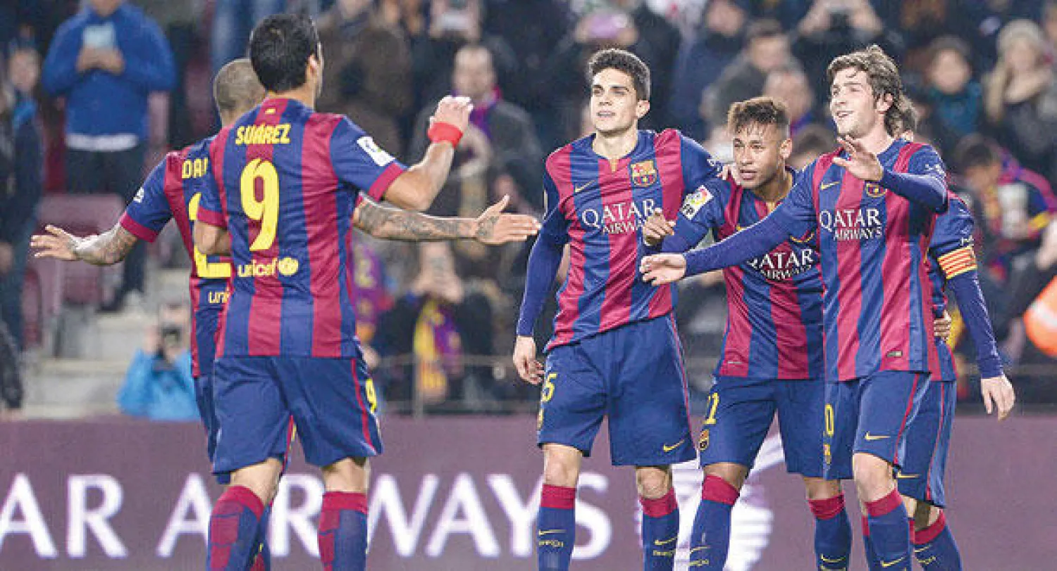 برشلونة يتجاوز أحزانه ويسحق إلتشي بخماسية بكأس أسبانيا قبل لقاء أتليتكو (أ.ف.ب)