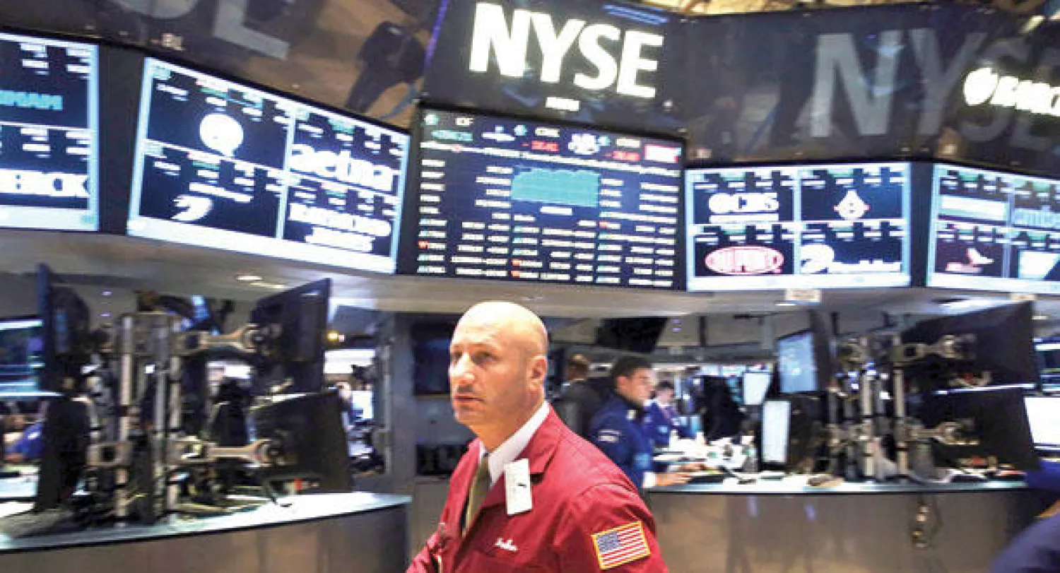 جانب من بورصة نيويورك في آخر تداولات الأسبوع (أ.ف.ب)