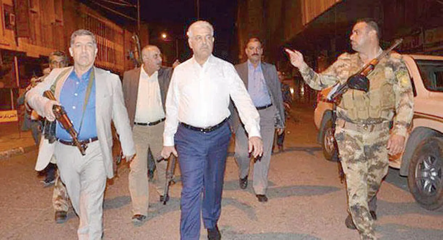 النجيفي في آخر ساعات وجوده في مدينة الموصل ليلة احتلالها من قبل تنظيم داعش ({الشرق الأوسط})