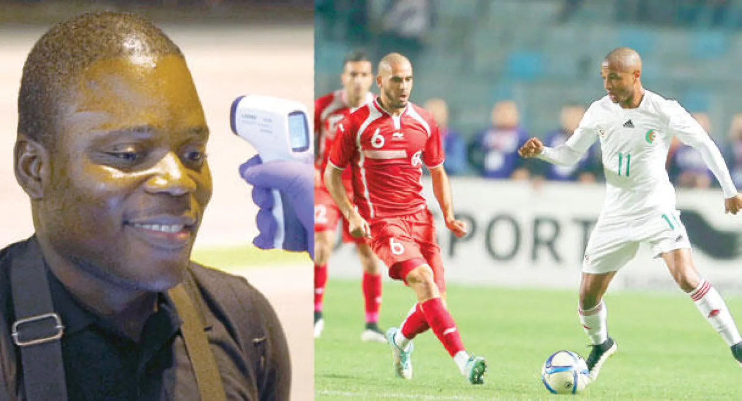 لقطة من المباراة الودية الدولية بين المنتخبين التونسي والجزائري التي أقيمت الأحد الماضي استعدادا للبطولة الأفريقية (إ.ب.أ)  -  رجل يخضع للكشف عن فيروس إيبولا في مطار باتا بغينيا (رويترز)