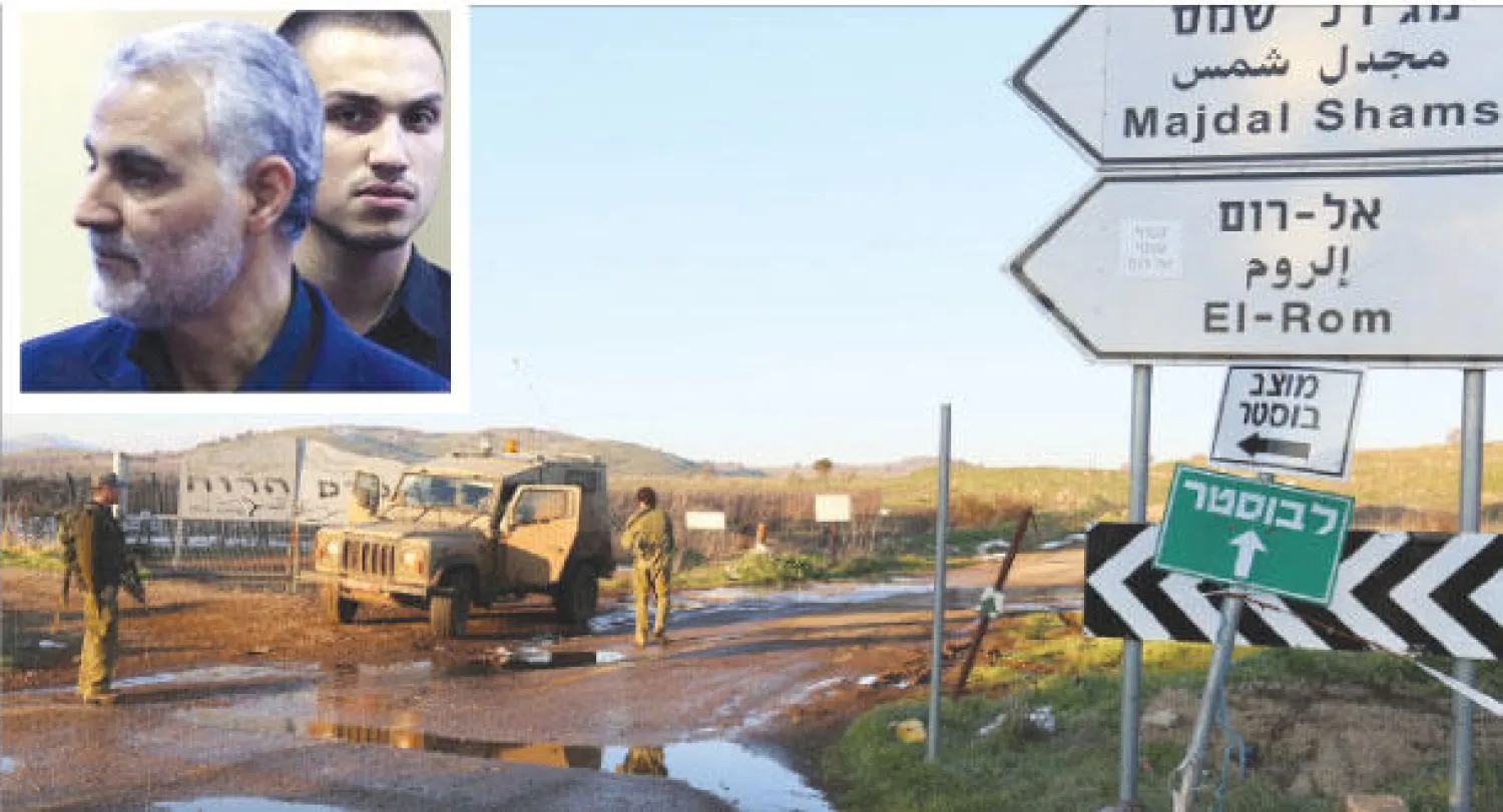 قوات إسرائيلية في الجانب المحتل من هضبة الجولان السورية أمس بالقرب من القنيطرة حيث تمت الغارة العسكرية (إ.ف.ب)  وصورة أرشيفية لجهاد عماد مغنية مع قائد فيلق القدس قاسم سليماني في طهران بثتها وكالة فارس الإيرانية