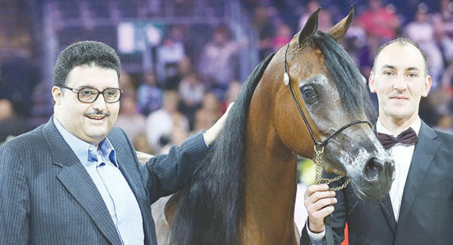 الأمير عبد العزيز بن أحمد لدى رعايته إحدى بطولات الخيل السابقة