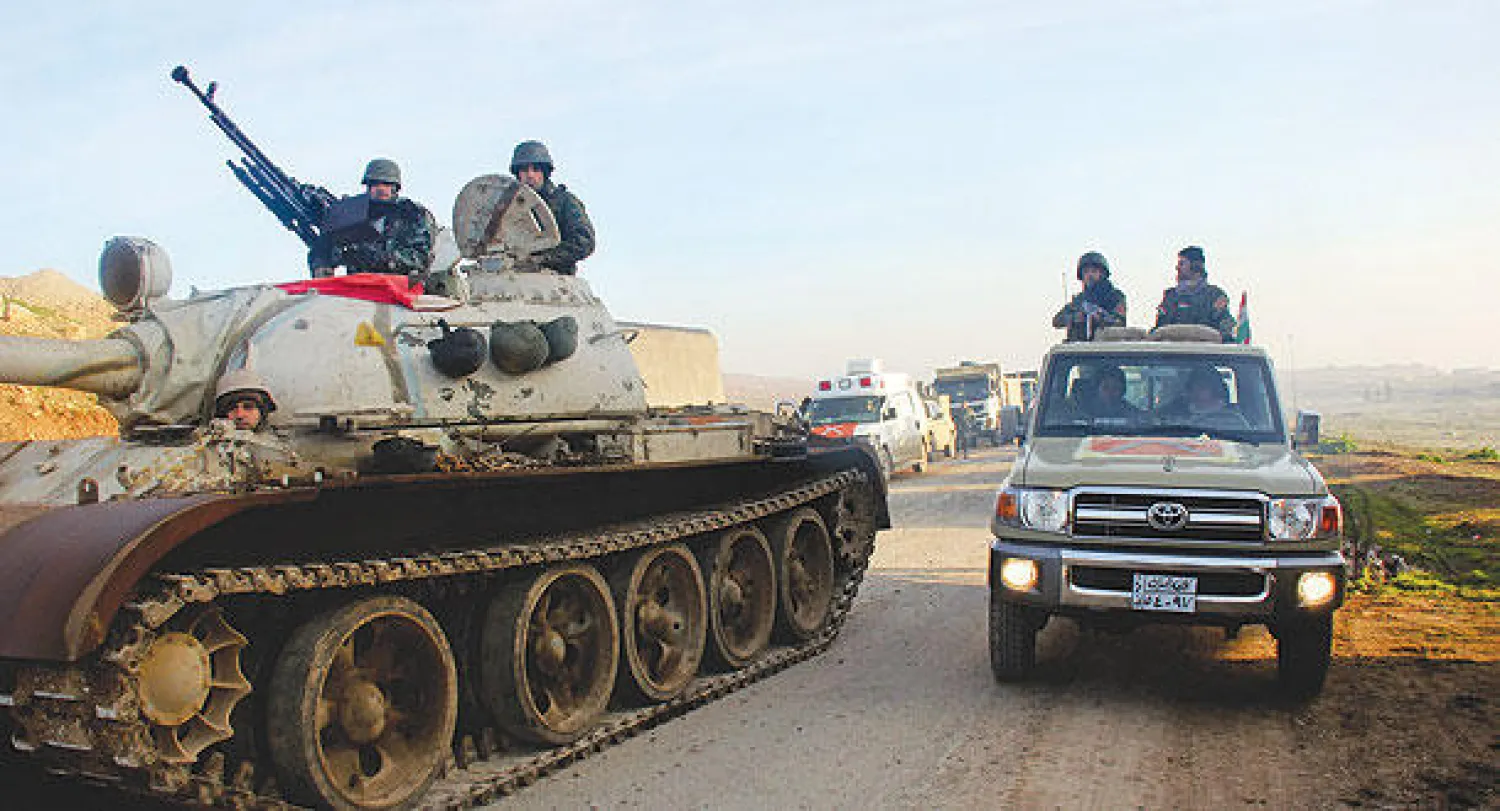 صورة وزعها مجلس أمن إقليم كردستان لقوات البيشمركة وهي تتقدم أمس في محور الموصل («الشرق الأوسط»)