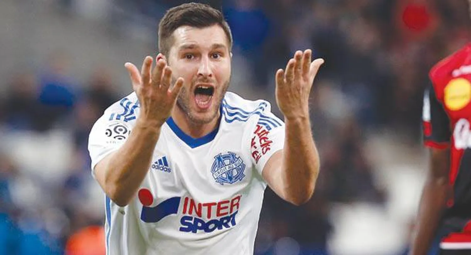 آندريه بيير جينياك لاعب مرسيليا وهدافه (رويترز)