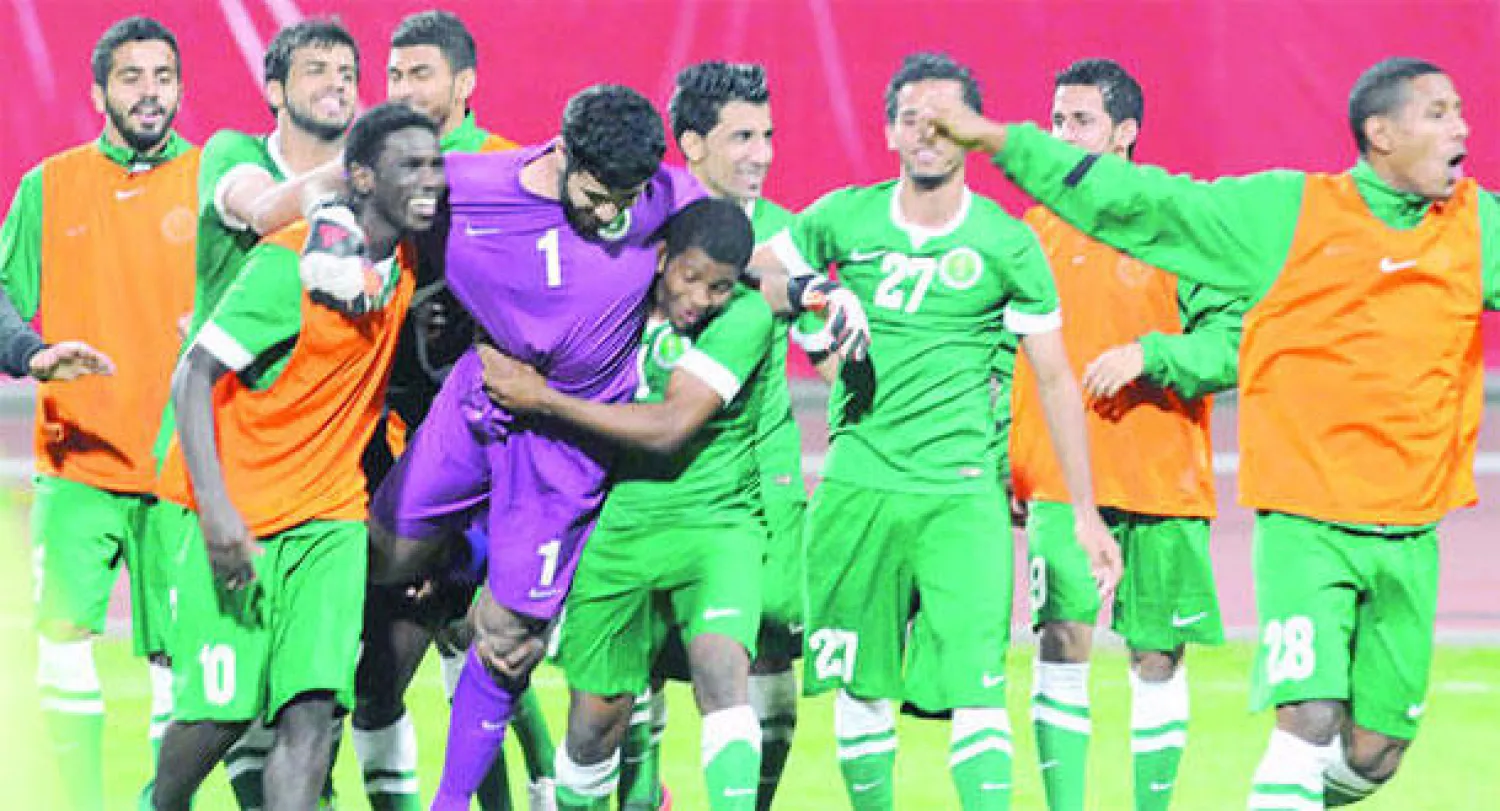 لاعبو المنتخب السعودي الأولمبي يحتفلون بتأهلهم لنهائي الخليج