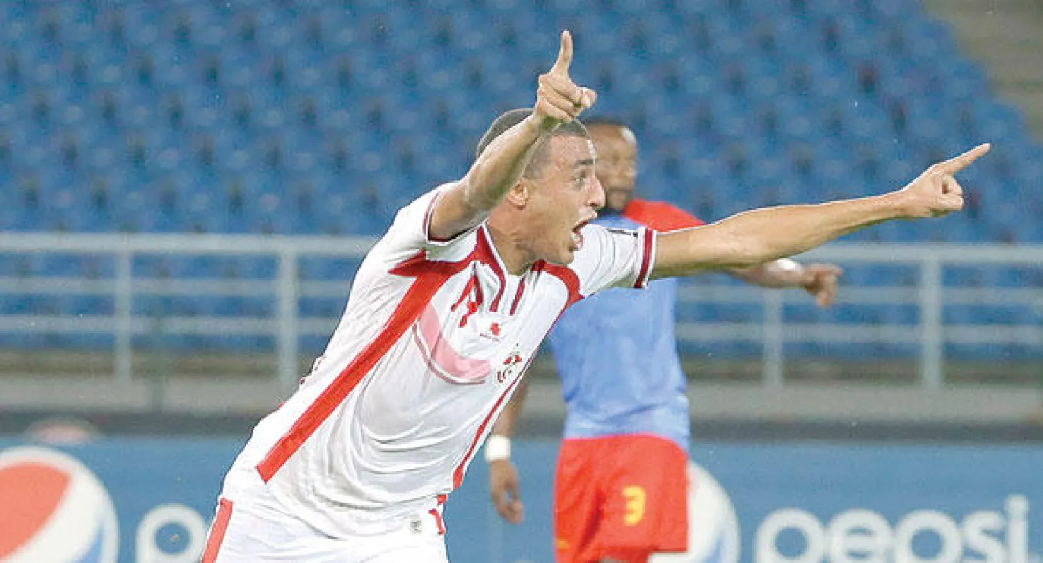 أحمد أكاشي يحتفل بإحرازه هدف تونس في شباك الكونغو الديمقراطية (أ.ب)