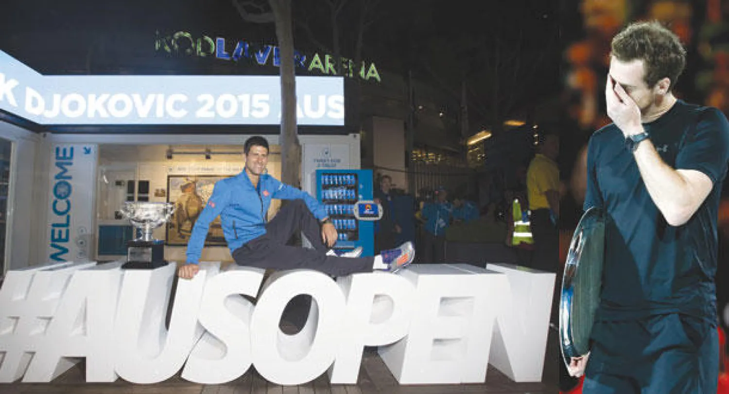 الإحباط على ملامح اندي موراي بعد الخسارة (إ.ب.أ)  -  ديوكوفيتش يتربع على قمة بطولة أستراليا للتنس بلقب خامس (أ.ف.ب)