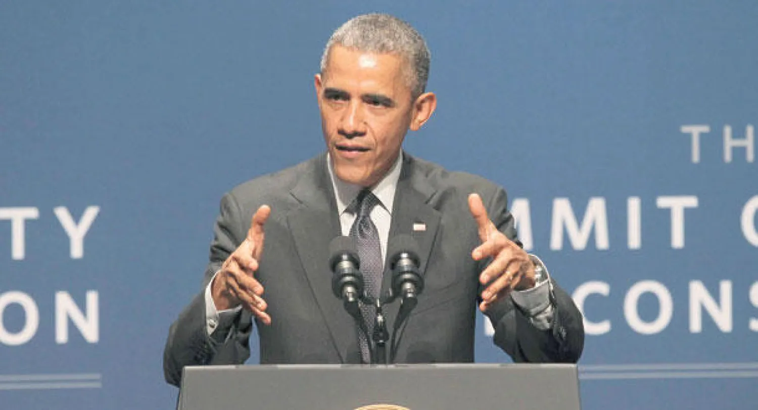 الرئيس الأميركي باراك أوباما خلال مشاركته في مؤتمر الحرب الإلكترونية في البيت الأبيض أول من أمس (رويترز)