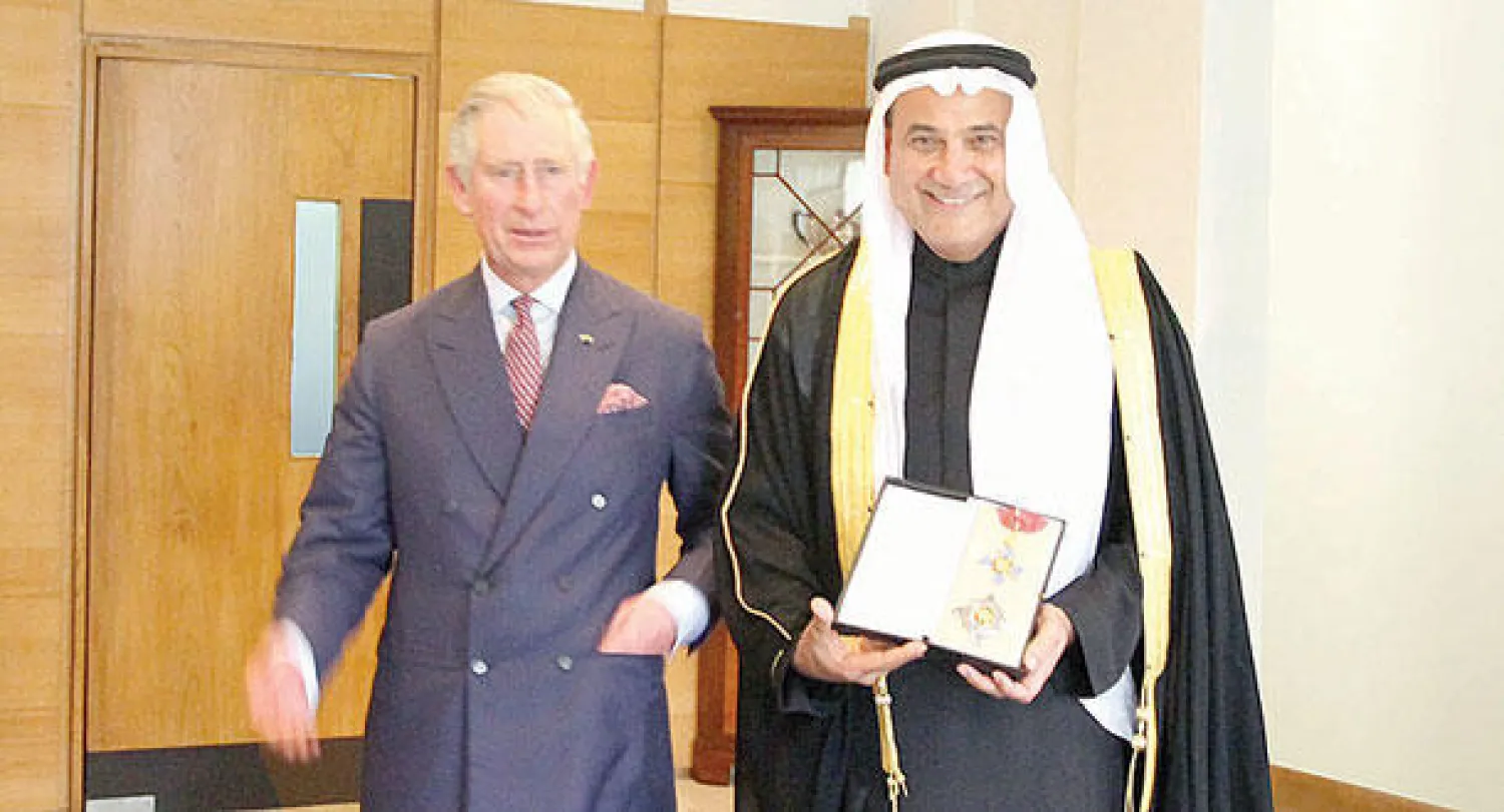 محمد عبد اللطيف جميل بعد تكريمه من الأمير تشارلز