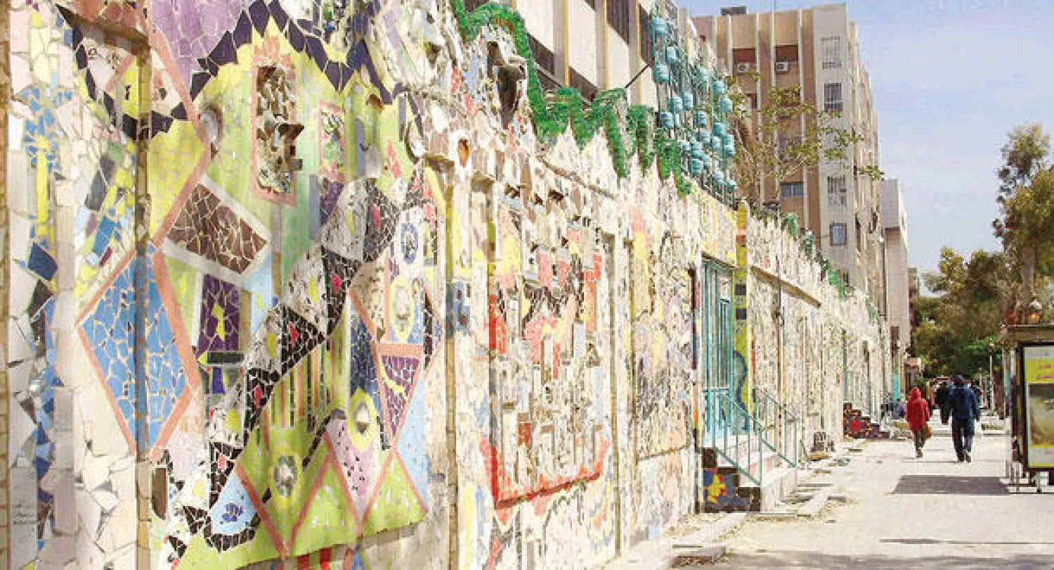 عمل من مخلفات البيئة من تنفيذ فريق {إيقاعات لونية}