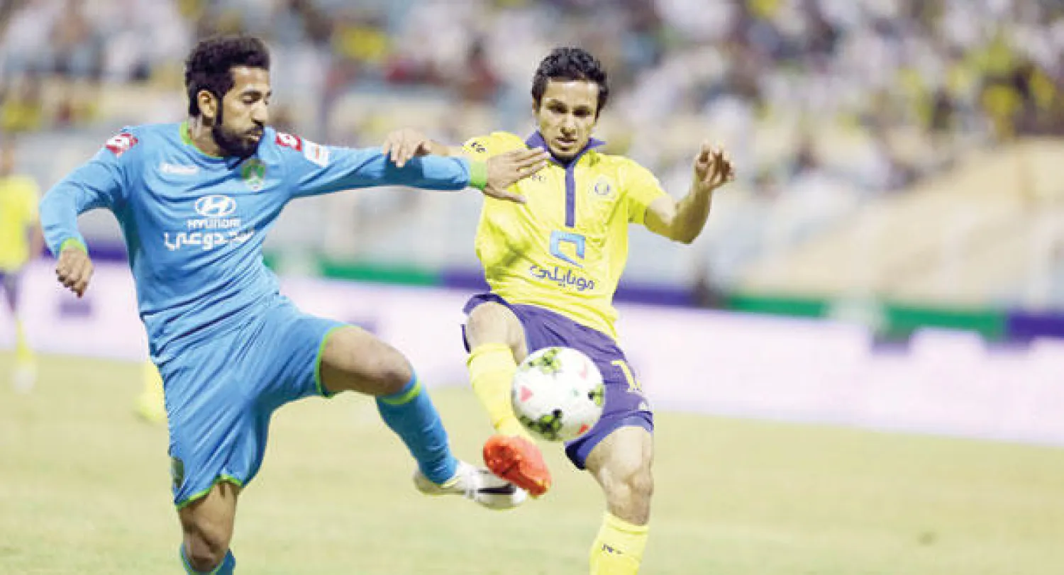 جانب من المباراة التي جمعت النصر والفتح (تصوير: عبد العزيز النومان)