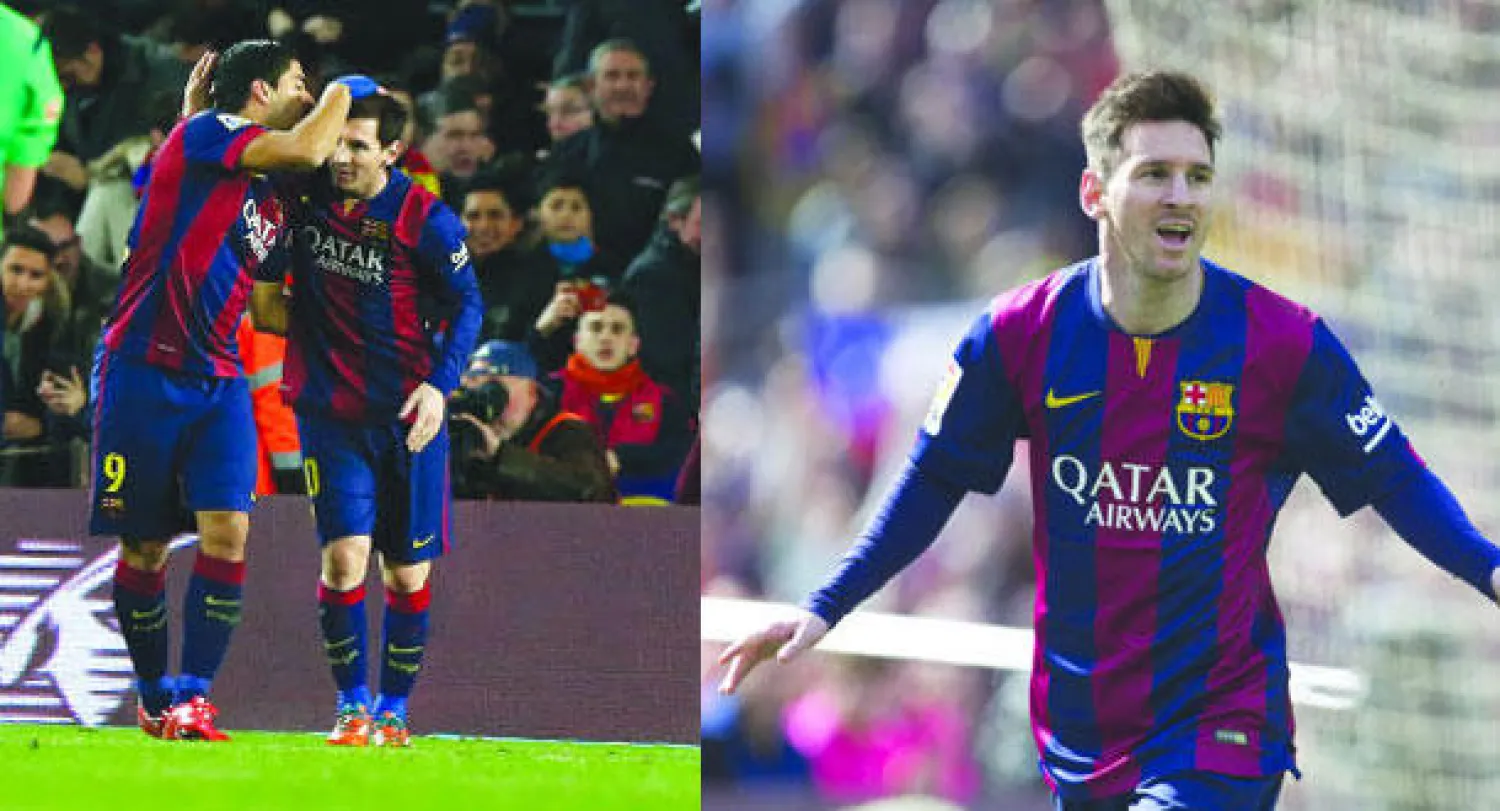 ميسي يحتفل بثلاثيته في مرمى رايو فايكانو ورقم 32 مع برشلونة (إ.ب.أ)  -  ميسي وسواريز يتبادلان التهئنة بعد أن سجلا 5 أهداف من سداسية برشلونة (رويترز)