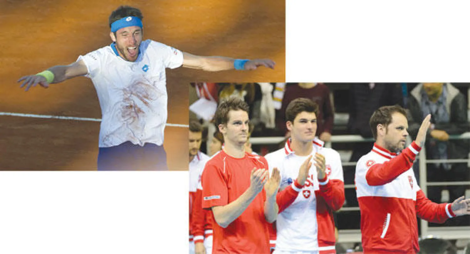 لاعبو بلجيكا يحتفلون بالفوز على سويسرا حاملة اللقب (إ.ب.أ)، وماير انتصر بعد مباراة ماراثونية ليقود الأرجنتين لربع النهائي (أ.ف.ب)