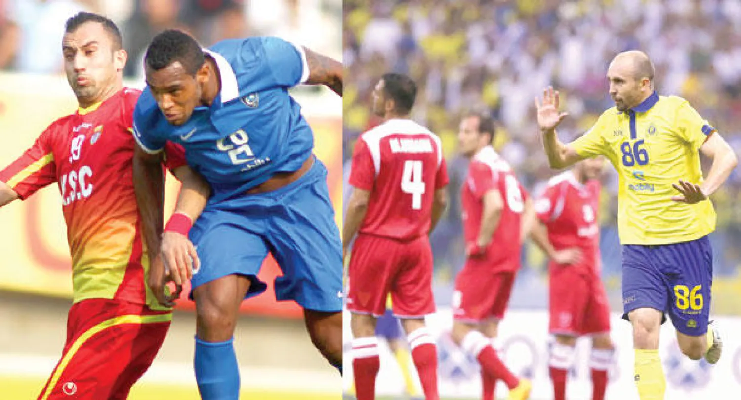 البولندي أدريان لاعب النصر يحتفل بهدفه في مرمى بيروزي الإيراني (تصوير: علي العريفي)  -  من مباراة الهلال وفولاذ الإيراني أمس في دوري أبطال آسيا ({الشرق الأوسط})