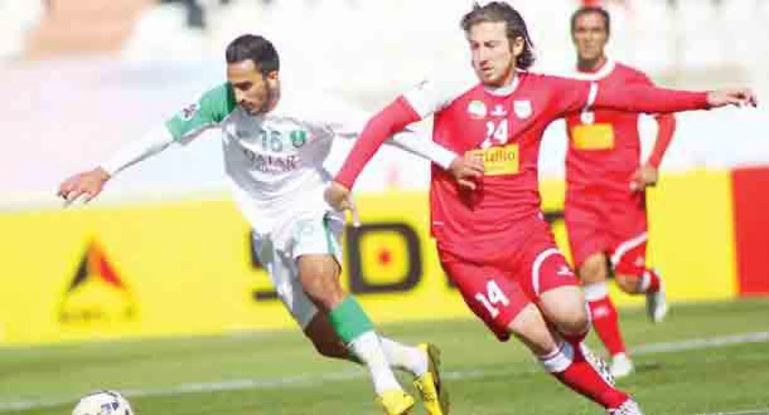 جانب من مباراة الأهلي وتبريز الإيراني أمس (أ.ف.ب)