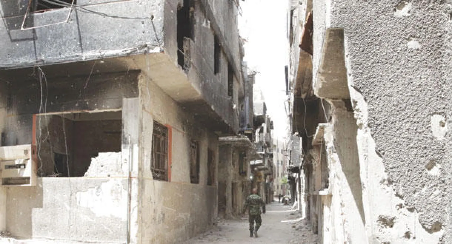 مخيم اليرموك تعرض لتدمير كبير بعد دخول «داعش» إليه وقصف الطيران ببراميل متفجرة (أ.ب)