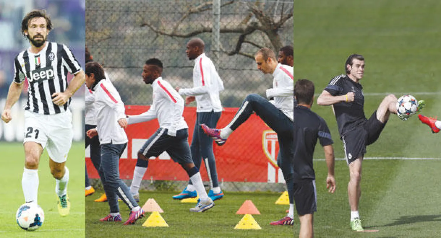 غاريث بيل يسيطر على الكرة وسط زملائه في تدريبات ريـال مدريد أمس (رويترز)  -  لاعبو موناكو يتدربون قبل مواجهة يوفنتوس (رويترز)  -  بيرلو نجم يوفنتوس شفي من الإصابة وجاهز للعب اليوم