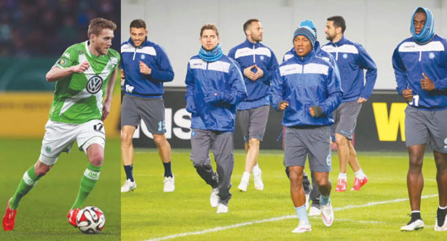 رحلة صعبة لنابولي إلى فولفسبورغ (إ.ب.أ)  -  أندري شورله نجم فولفسبورغ (أ.ف.ب)