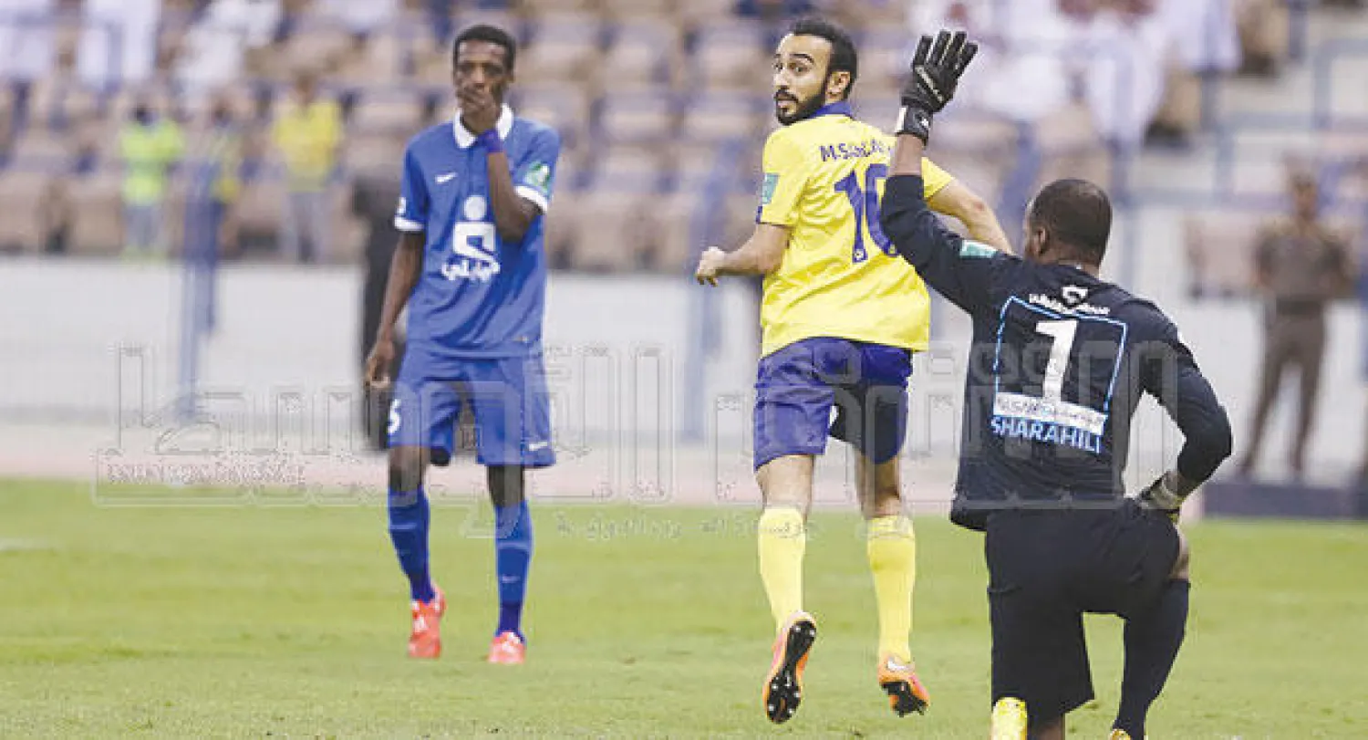 محمد السهلاوي فرحًا بهدفه الذهبي في شباك الهلال (تصوير: عبد العزيز النومان)