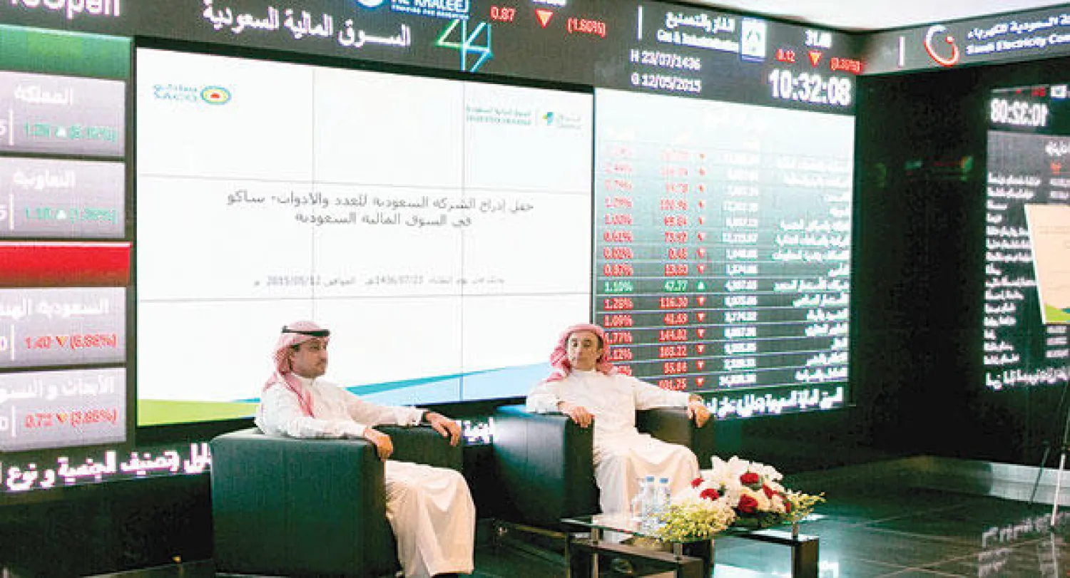 ممثلا شركتي «تداول» و«ساكو» خلال حفل الإدراج يوم أمس («الشرق الأوسط»)