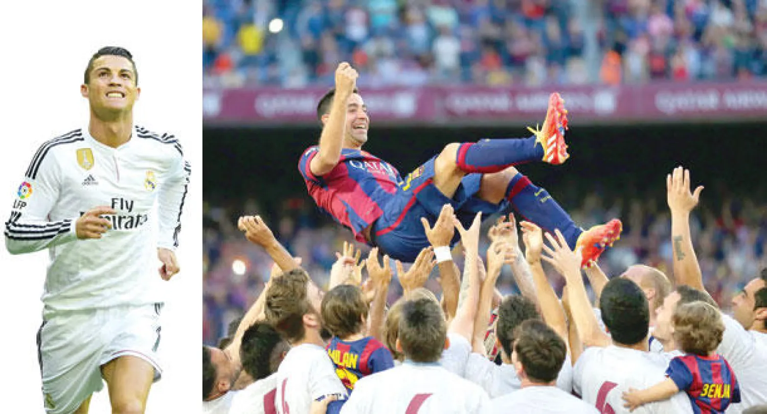 لاعبو برشلونة يحملون تشافي احتفاء به في ختام مسيرته مع الفريق بالتتويج بلقب الدوري (أ.ب)  -  رونالدو سجل ثلاثية في مرمى خيتافي ليؤكد تربعه على قمة الهدافين (رويترز)