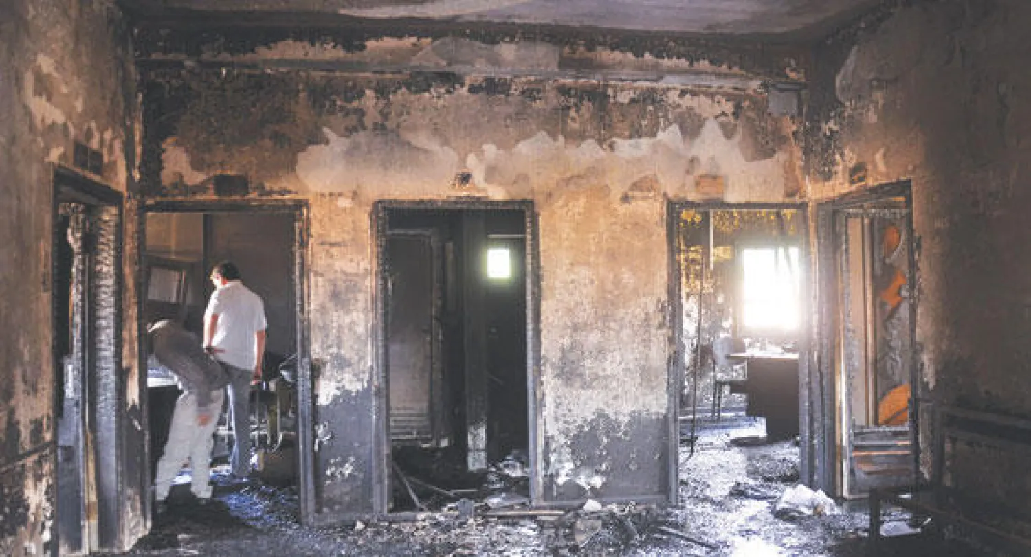 مركز ميسلون الصحي في القامشلي شمال شرقي سوريا الذي تعرض لحريق أمس تسبب في مقتل 27 شخصا معظمهم من الأطفال (أ.ف.ب)