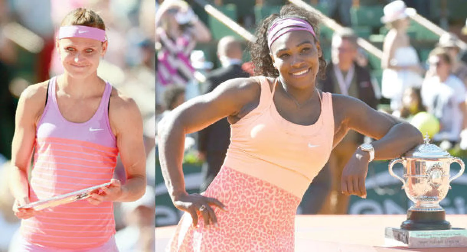 سيرينا وليامز بعد تتويجها بلقب بطولة فرنسا المفتوحة (أ.ف.ب)  -  سافاروفا ومشوار رائع انتهى بالوصافة (رويترز)