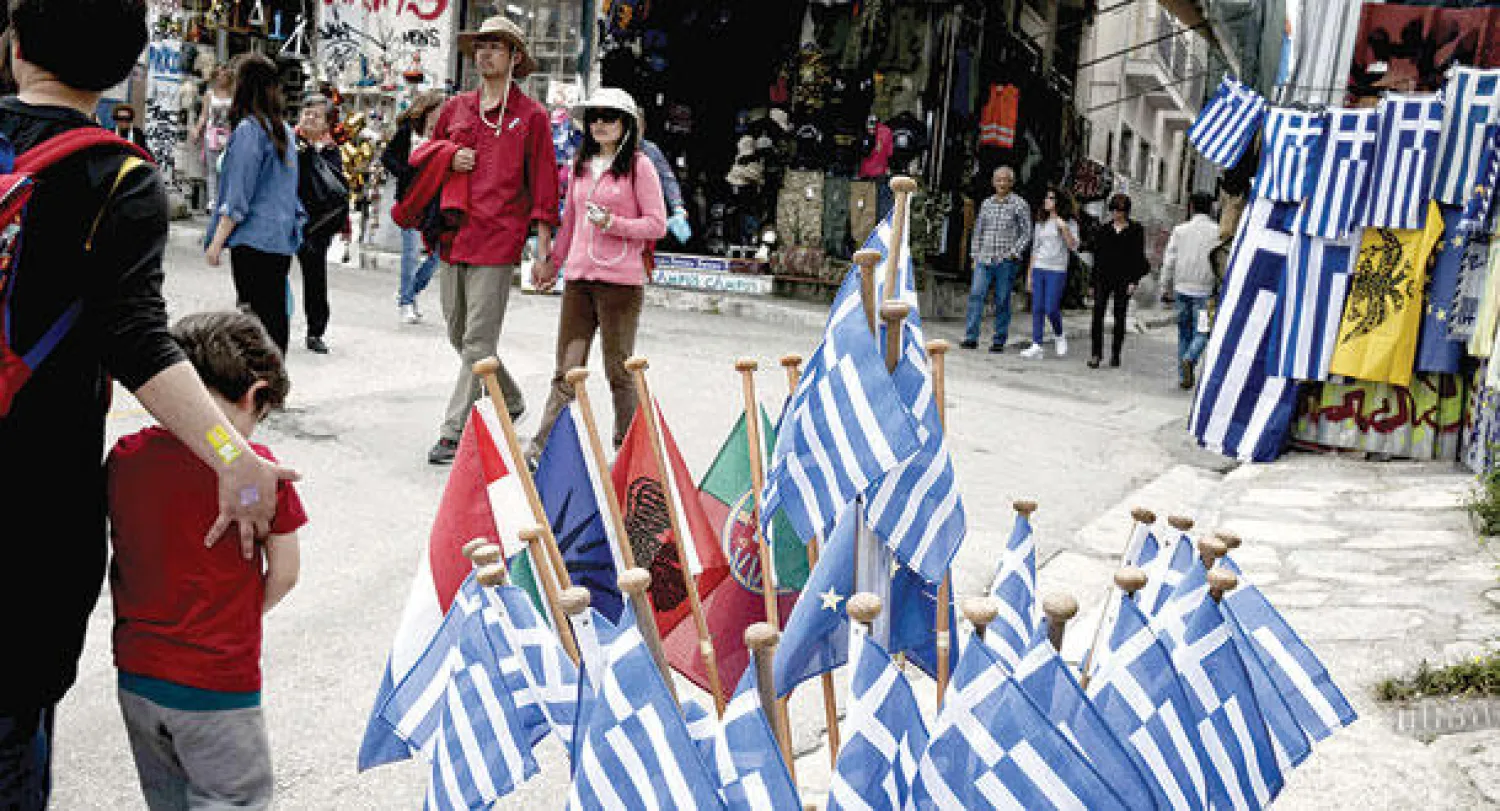 الحكومة اليونانية قد تتجاوز الخطوط الحمراء المتعلقة بتسوية وضعيتها المالية وضمان استمرار حصولها على الأموال الضرورية (أ.ف.ب)