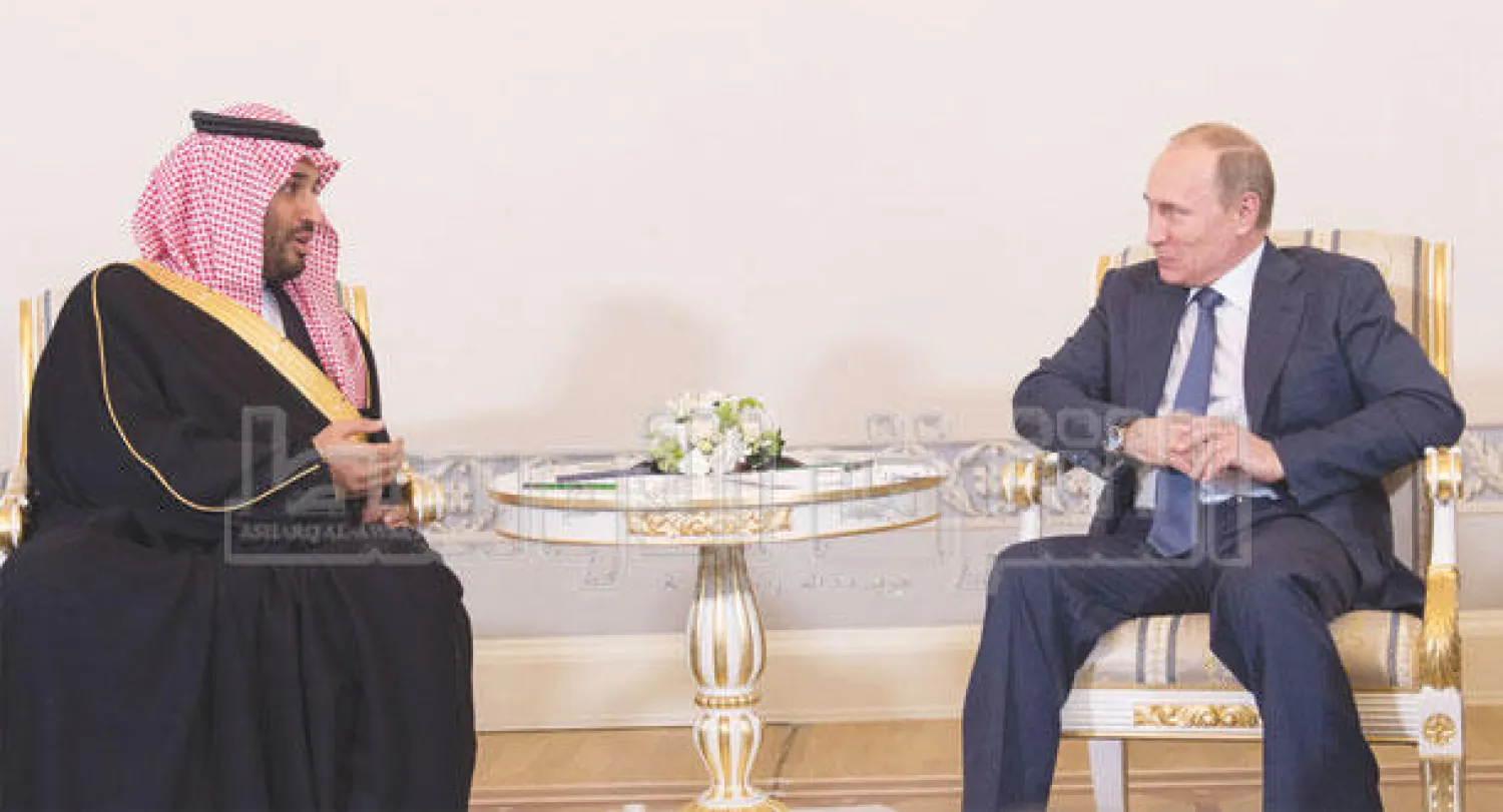 حديث بين ولي ولي العهد السعودي، والرئيس الروسي (تصوير: بندر الجلعود)