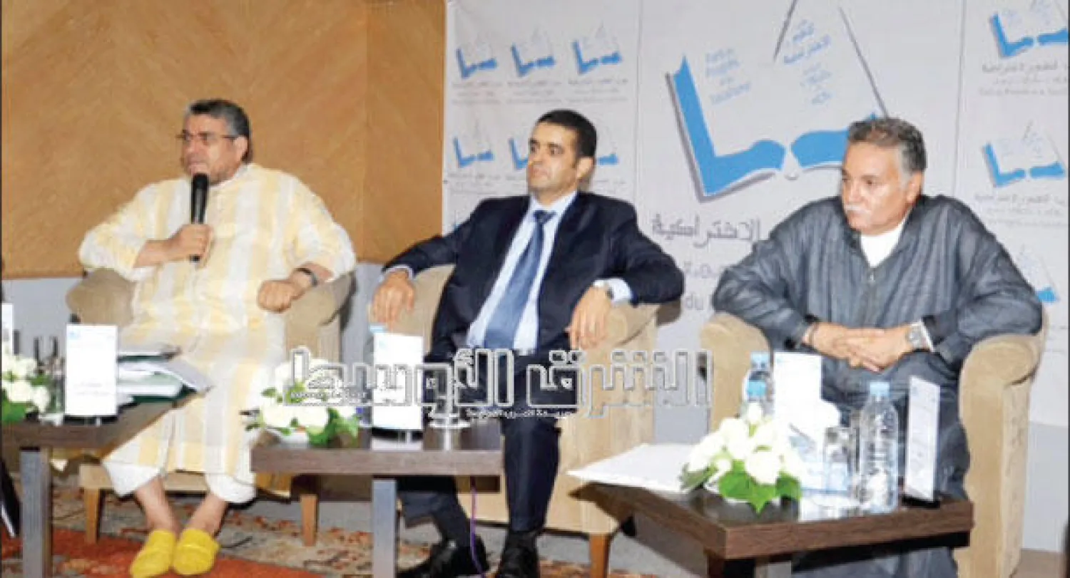 نبيل بن عبد الله ومصطفى الرميد خلال مشاركتهما في ندوة حول مشروع تعديل القانون الجنائي المغربي (تصوير: مصطفى حبيس)