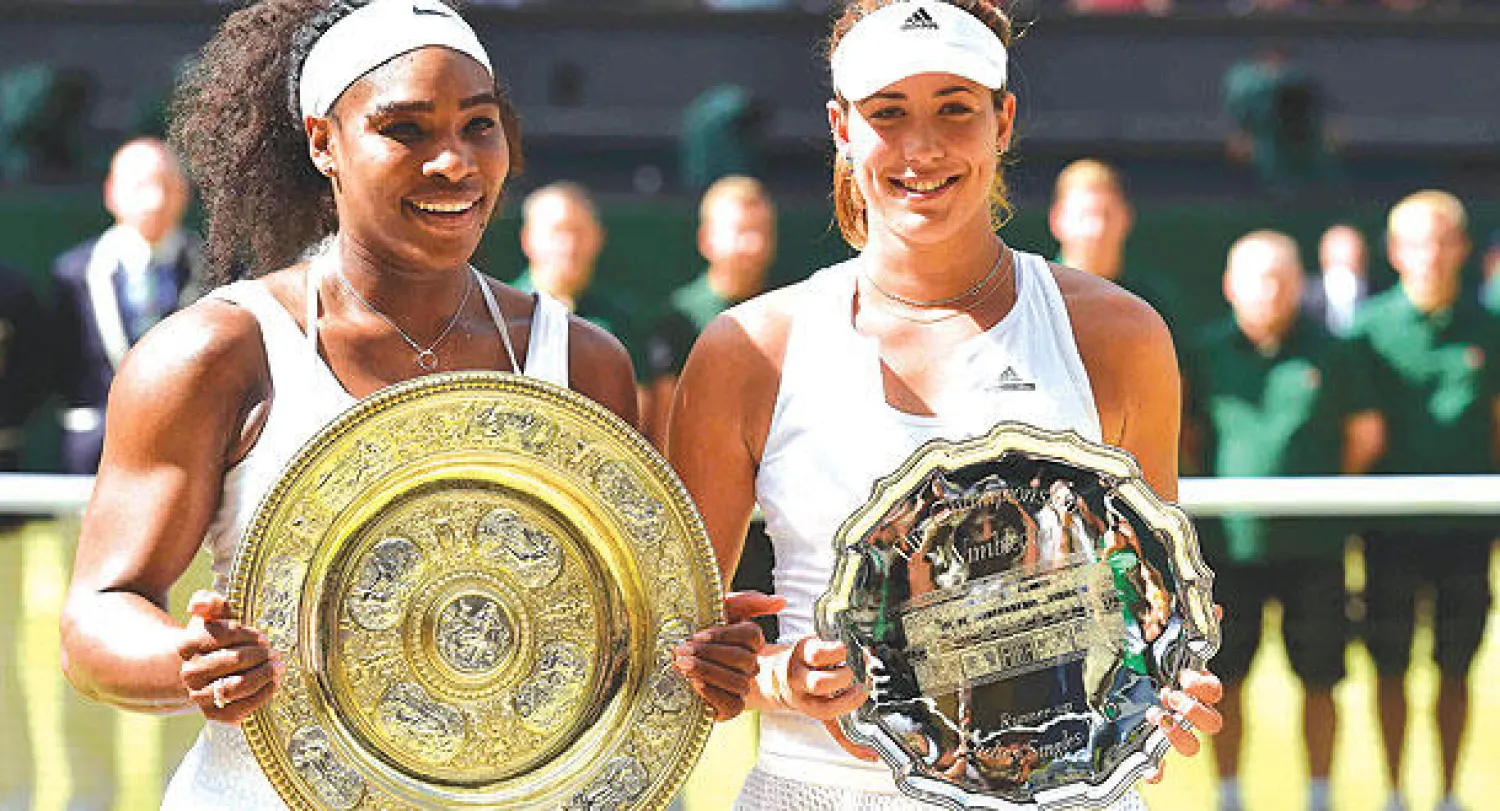 سيرينا البطلة ووصيفتها غاربيني (رويترز)