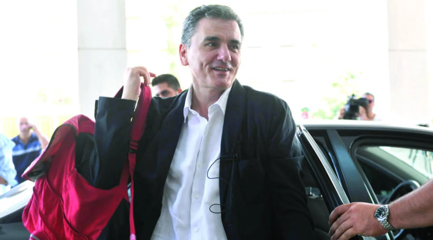 وزير المالية اليوناني ايوكليد تساكالاتوس (أ. ب)