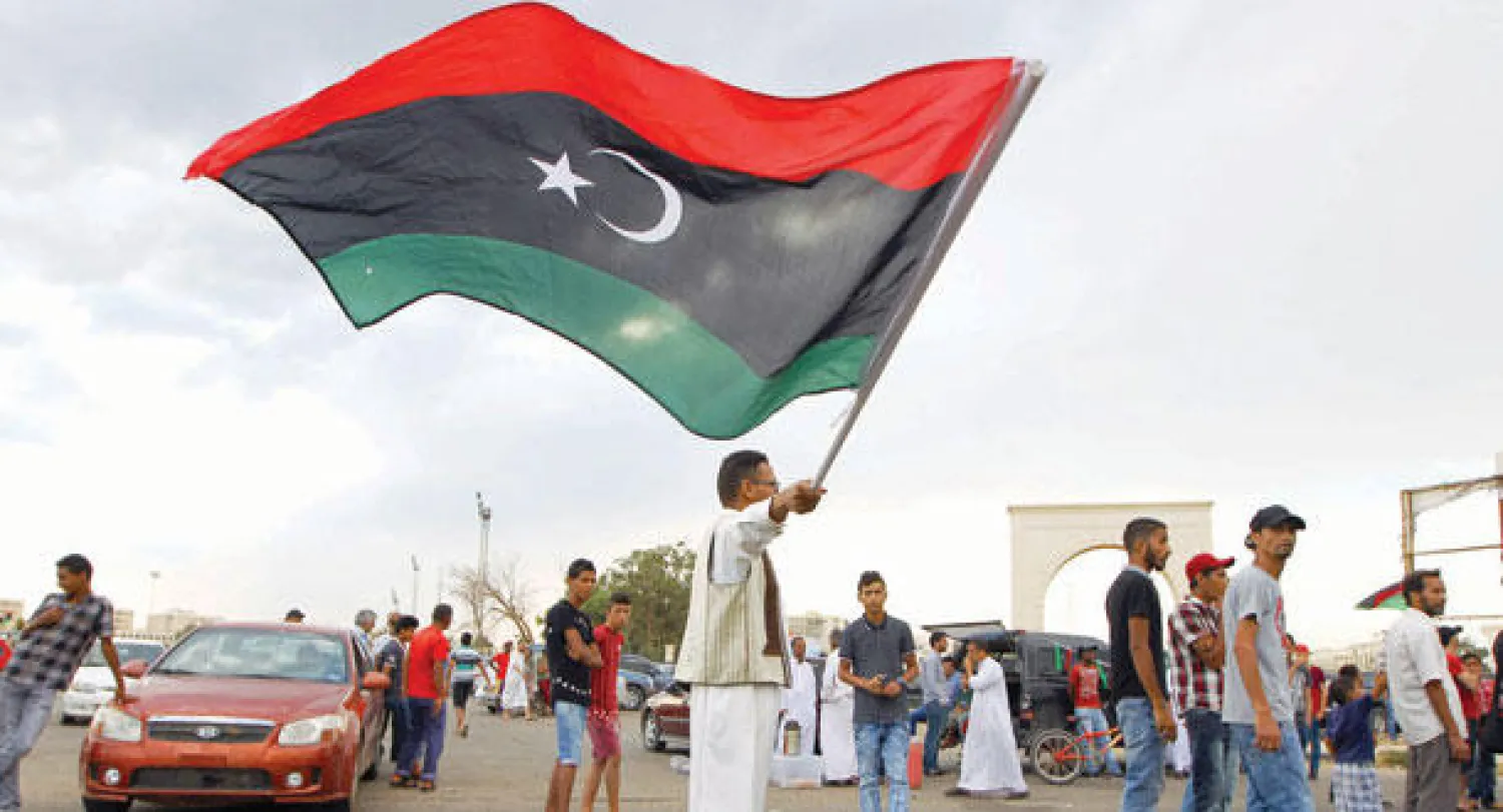 ليبيون في مظاهرة ضد أنصار النظام السابق  (أ.ف.ب)