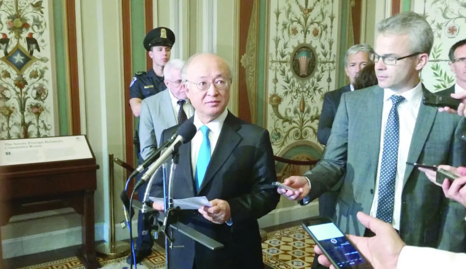 صورة ارشيفية للأمين العام للوكالة الدولية للطاقة الذرية يوكيا أمانو وهو يخاطب الصحافيين حول الاتفاق النووي في واشنطن (أ. ف. ب)