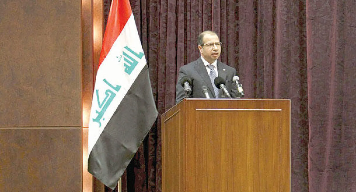 رئيس البرلمان العراقي سليم الجبوري يتحدث أمام مؤتمر تحرير الأنبار في بغداد أمس (رويترز)