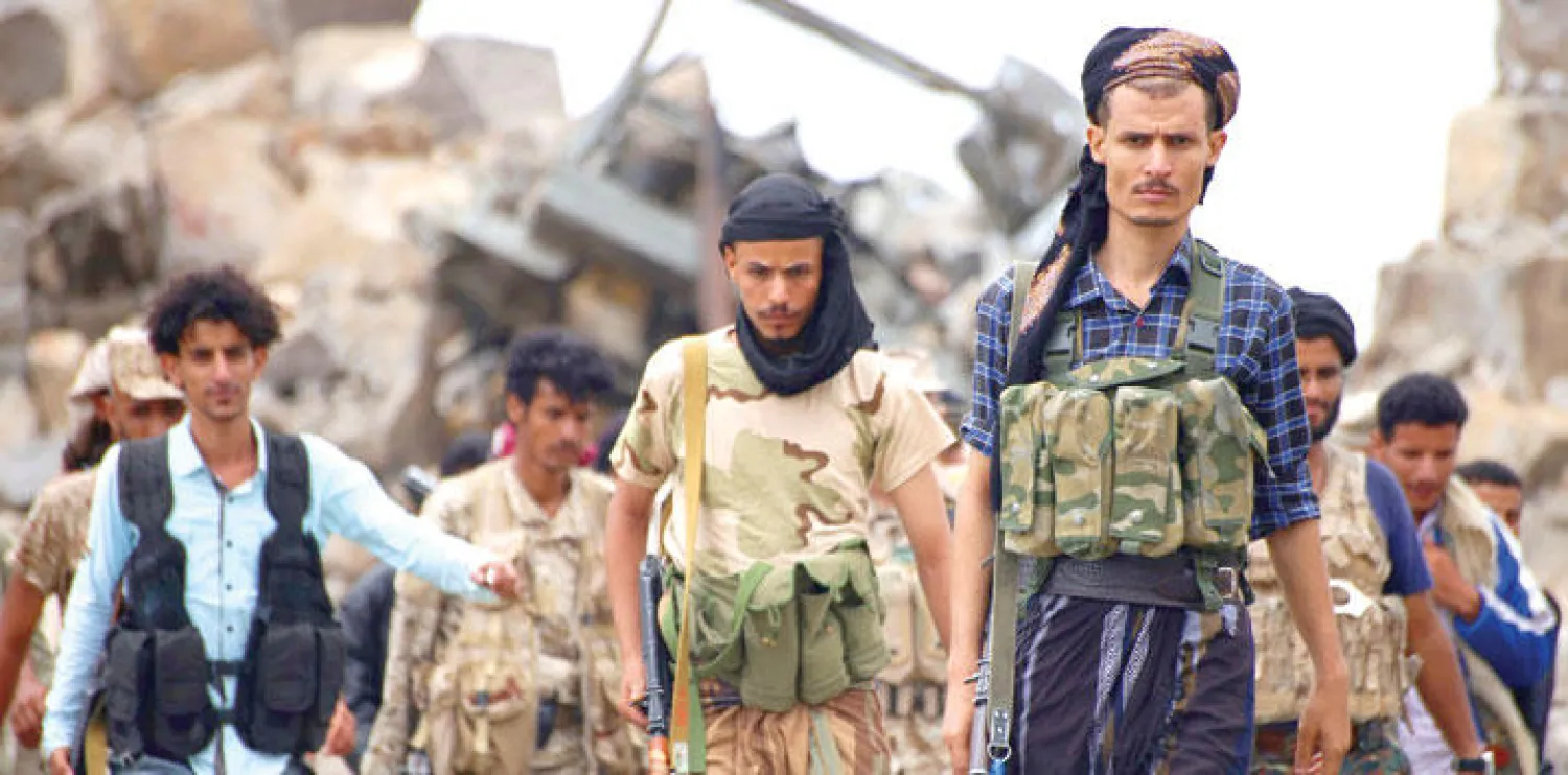 عناصر من قوات المقاومة الموالية للرئيس هادي في تعز أول من أمس (أ.ف.ب)